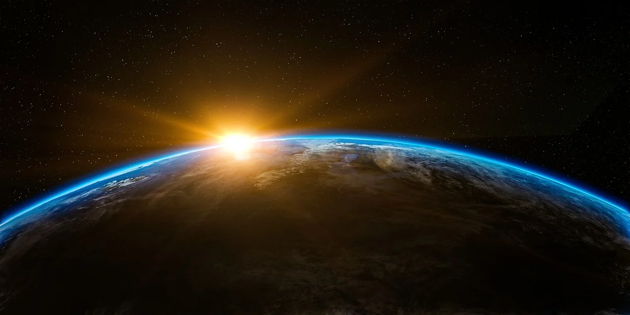 Imagen representando la presencia internacional de Trinity Guard, mostrando la Tierra vista desde el espacio al amanecer